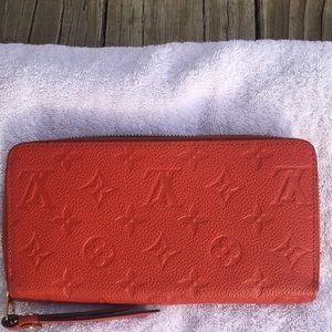 Authentic LV Orient Empreinte Leather Monogram Zippy